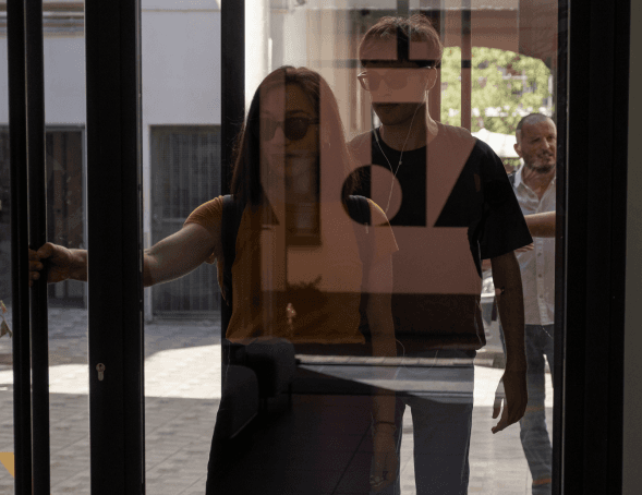 People entering inside Notomia's office